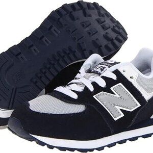 New Balance kids 574 V1 Classic Lace-Up Sneaker navy color